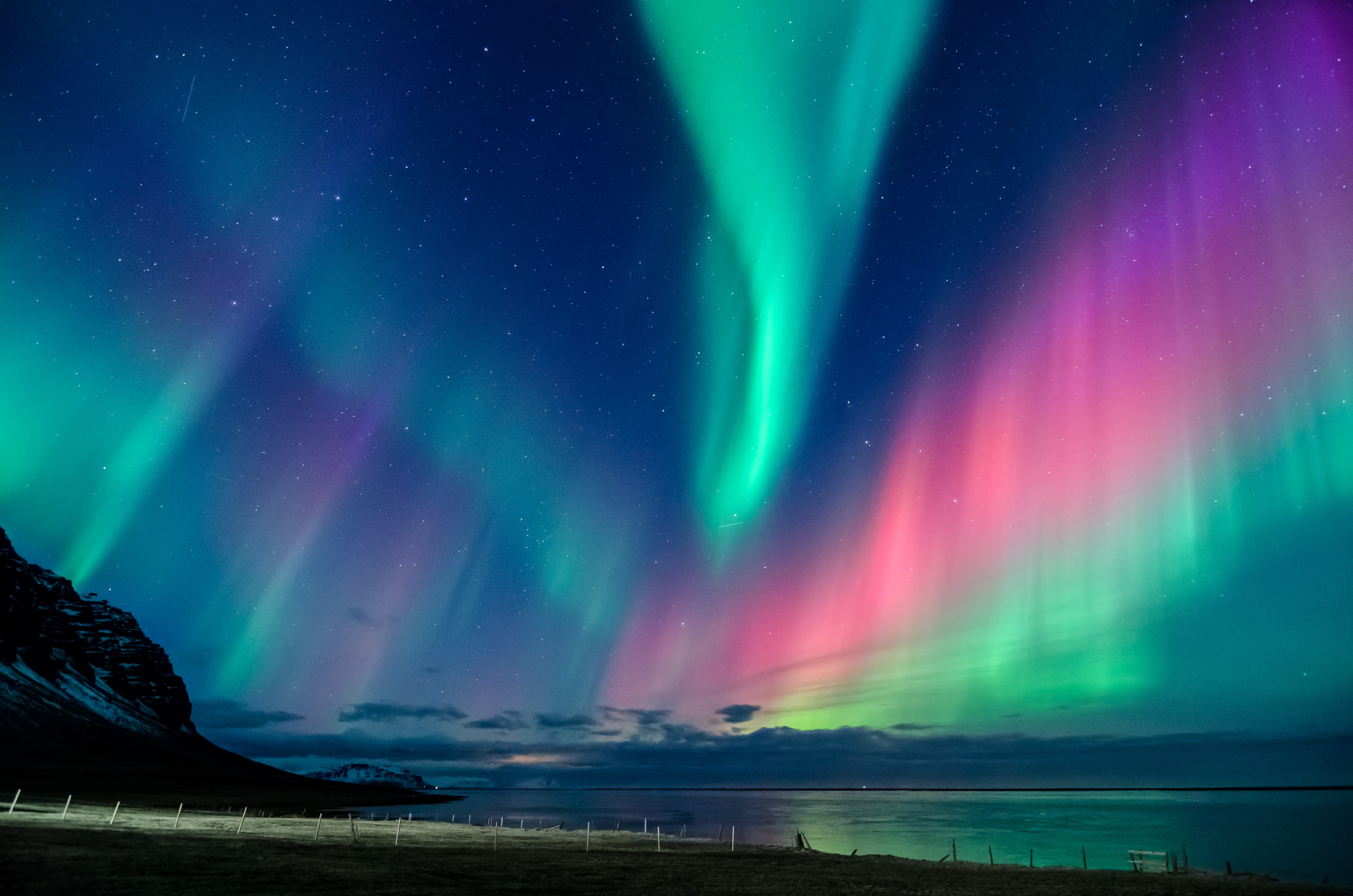 https://guidetoiceland.is/image/437199/x/0/northern-lights-in-all-the-colors-of-the-rainbow-dance-across-the-sky-in-iceland-6.jpg